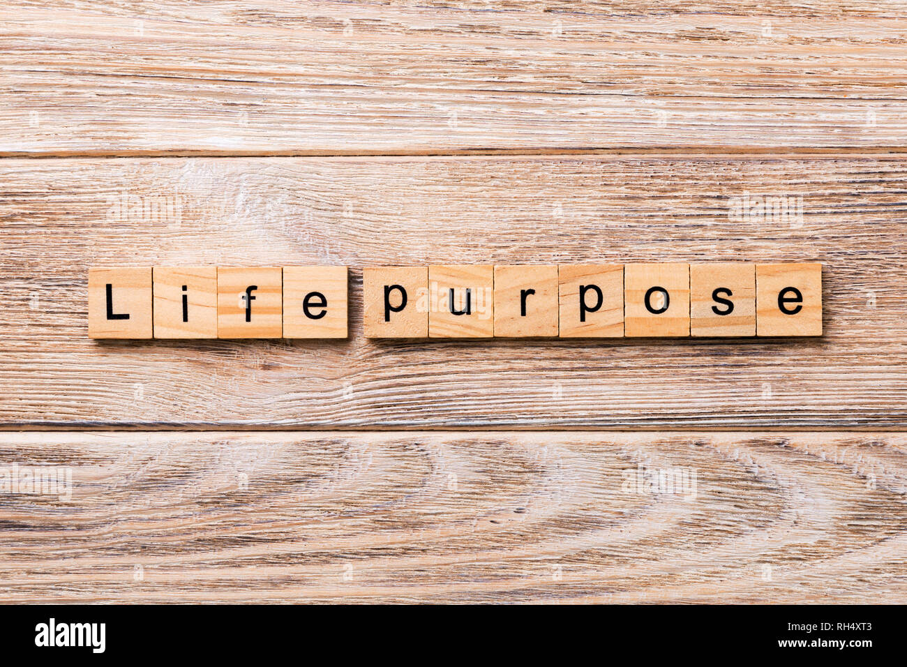 life purpose word written on wood block. life purpose text on wooden table for your desing, concept. Stock Photo