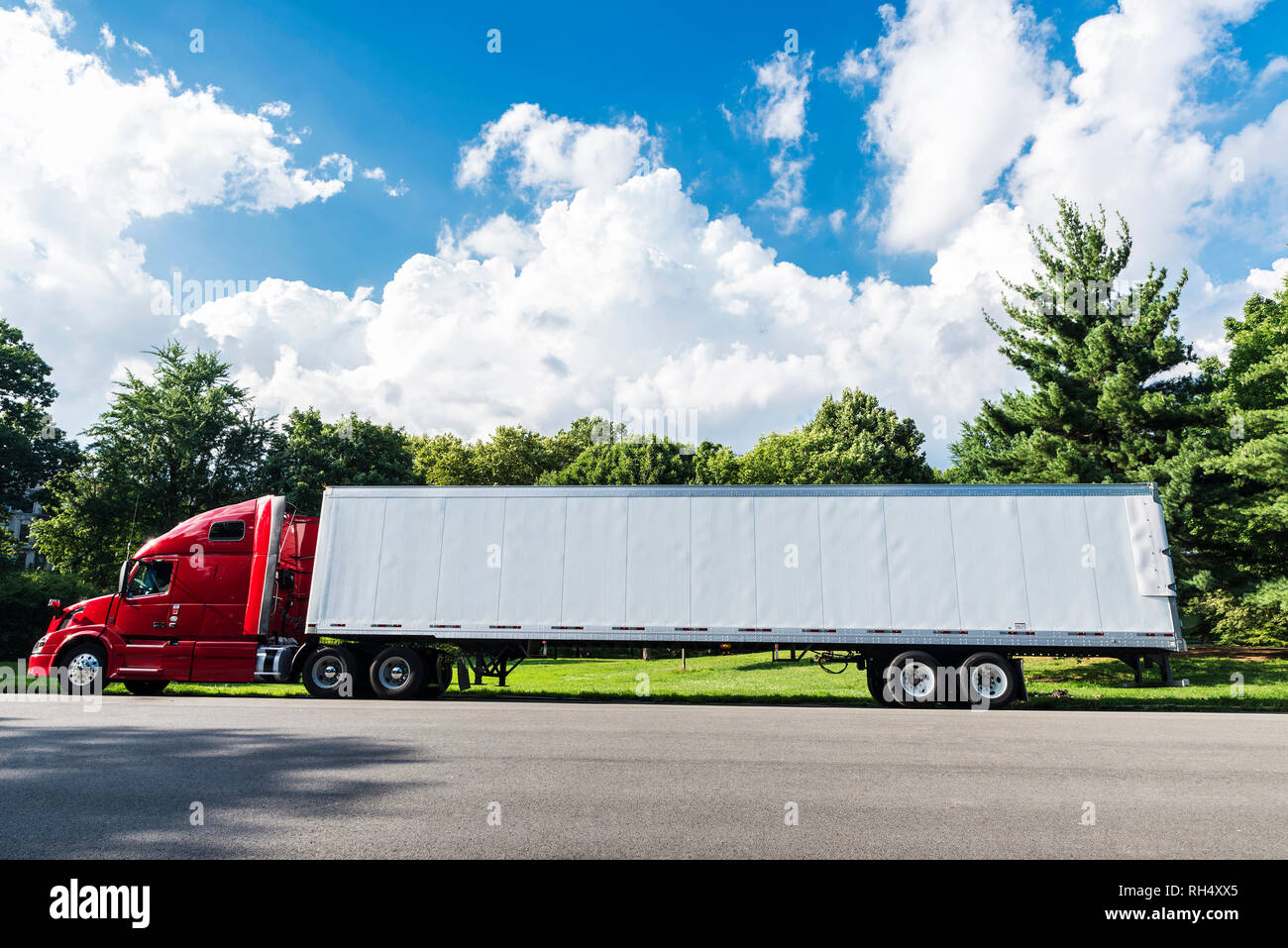 Heavy red and white truck equipped with refrigeration goods parked in a Central Park, Manhattan, New York City, USA Stock Photo