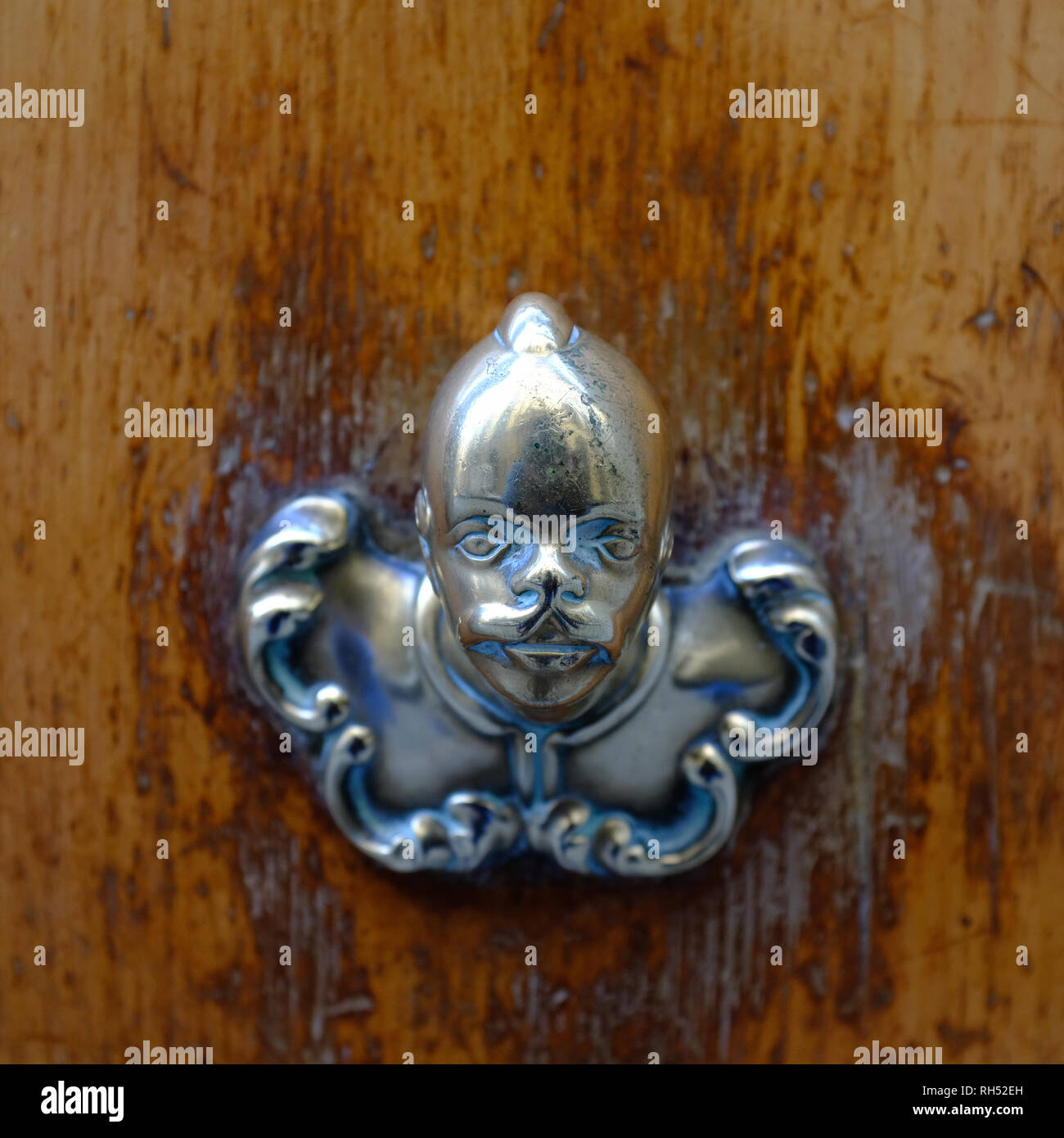 African Face Ornate Vintage Decorative Door Knob On Distressed