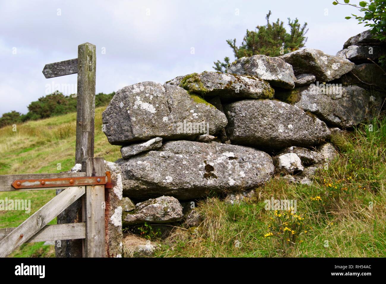 Wooden Farm Gate and Drystone Wall at Wistmans Wood Car Park. Dartmoor National Park, Devon, UK. Stock Photo
