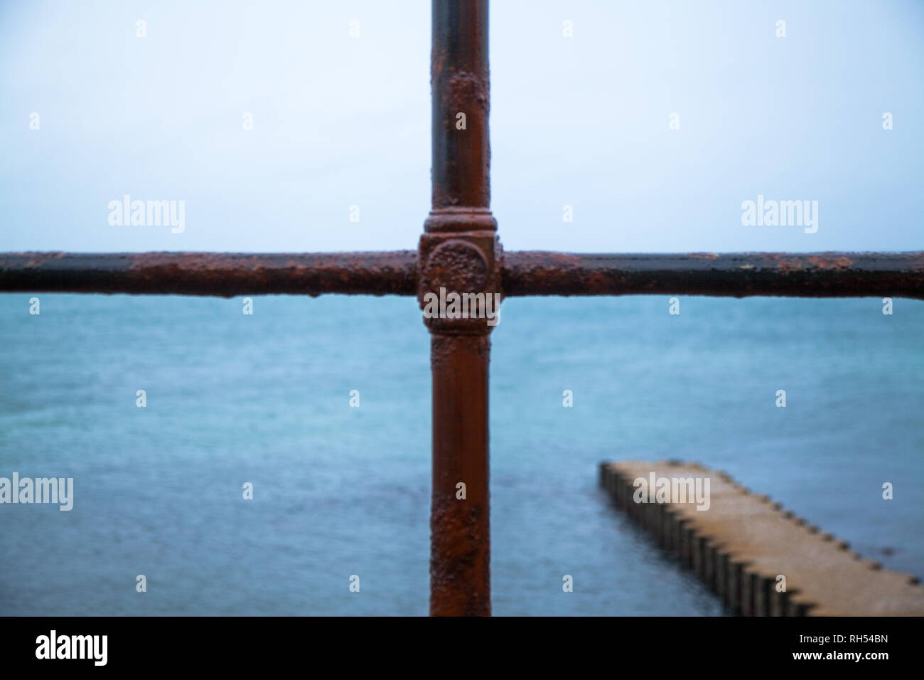View through vintage iron railings with Jetty in bottom corner Stock ...