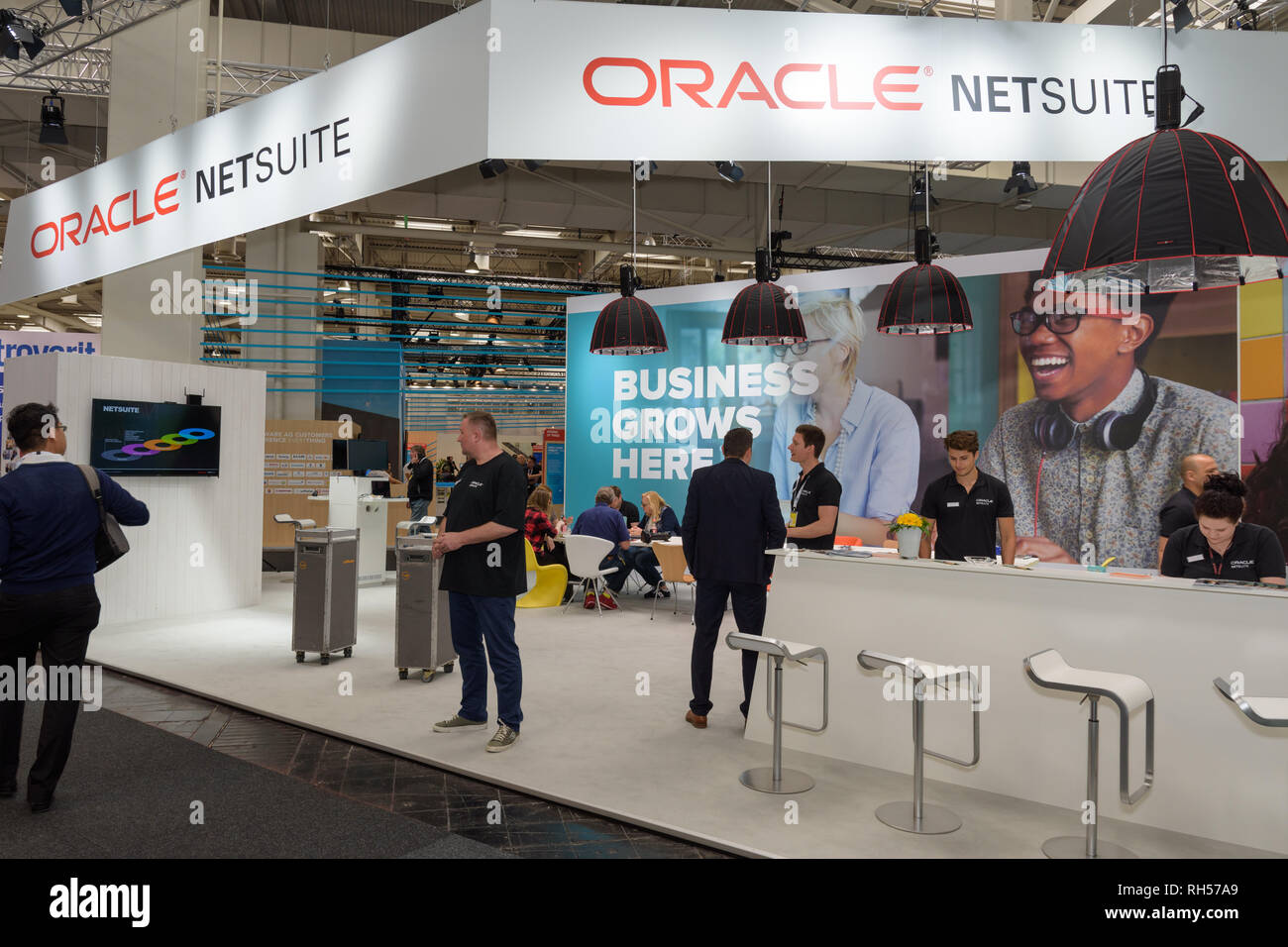 Hannover, Germany - June 13, 2018: Oracle netsuite employees at their booth at CeBIT 2018. CeBIT is the world's largest trade fair for information tec Stock Photo