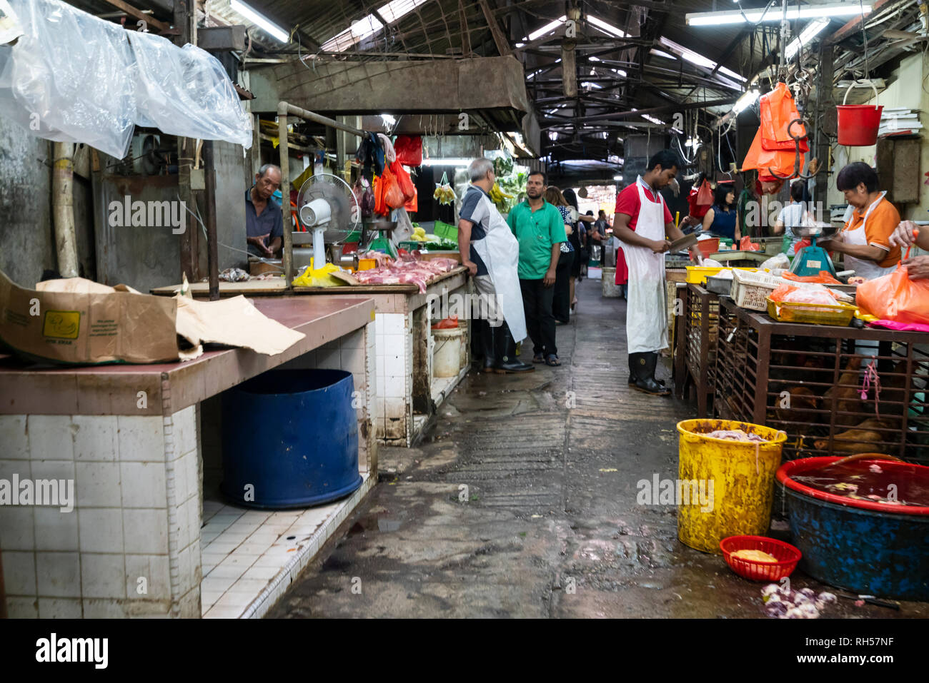 meat seller in the street in Chinatown in Kuala Lumpur, Malaysia Stock Photo