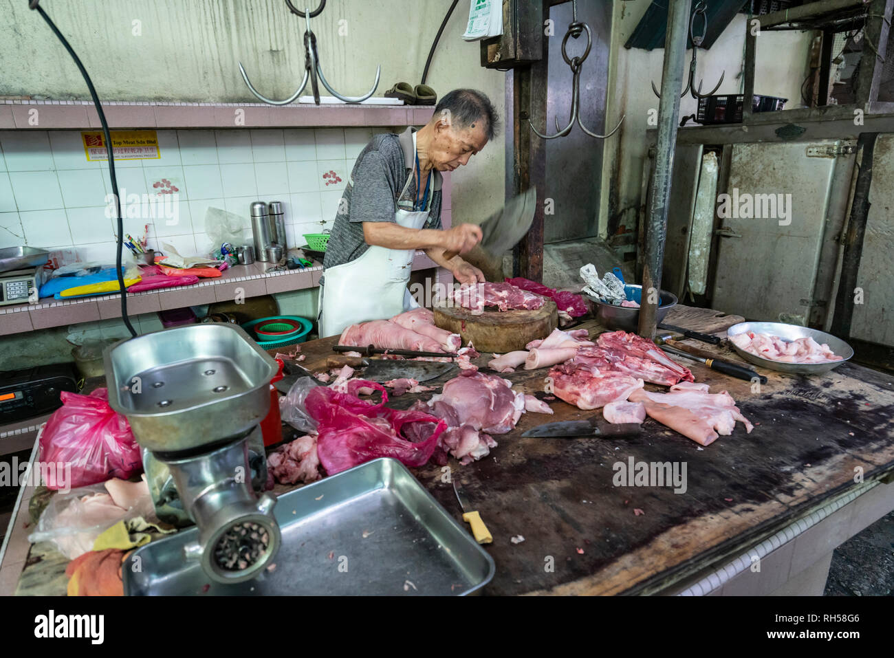 meat seller in the street in Chinatown in Kuala Lumpur, Malaysia Stock Photo