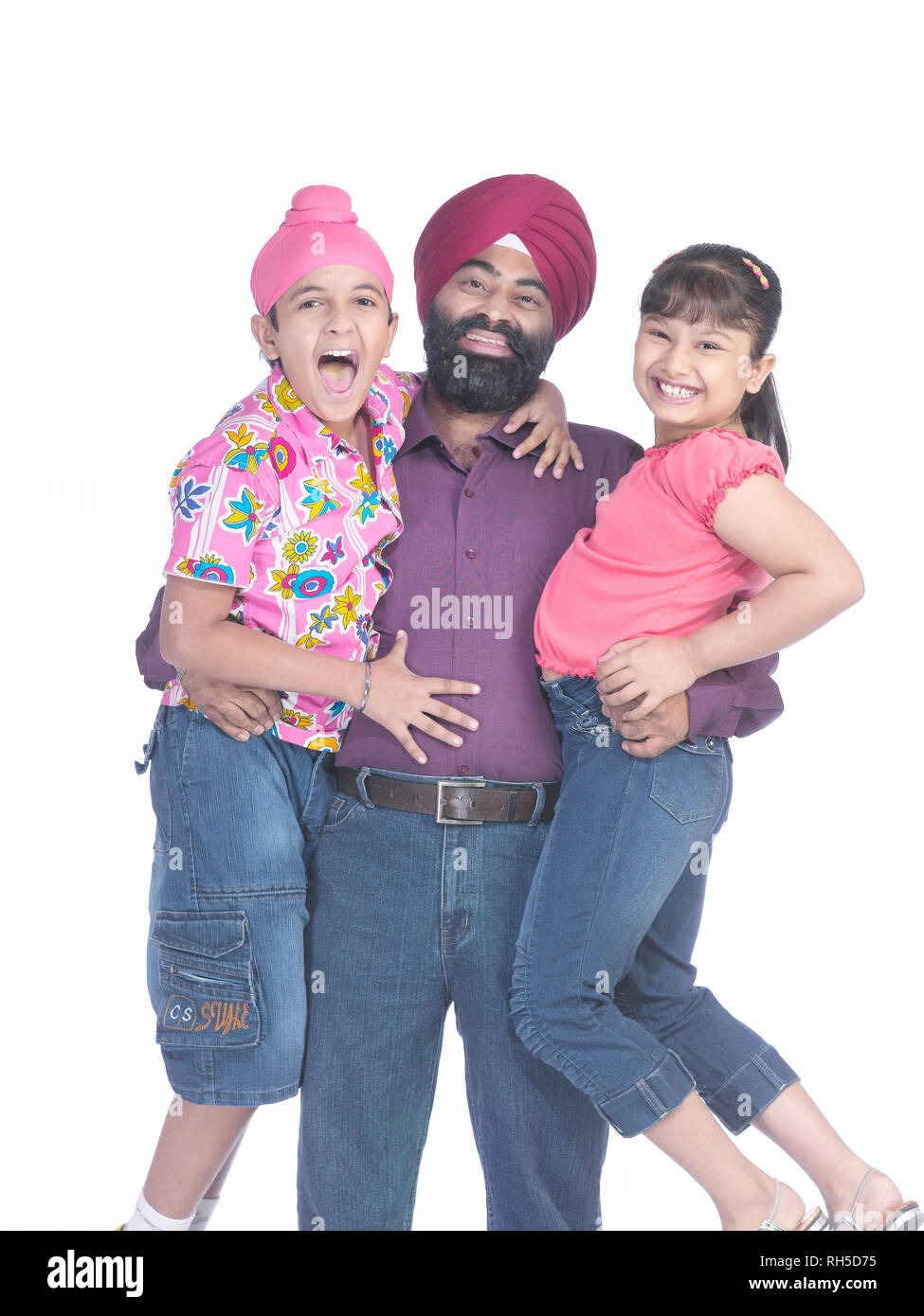 PORTRAIT OF A SIKH SARDAR WITH HIS SON AND DAUGHTER SHARING A HAPPY ...