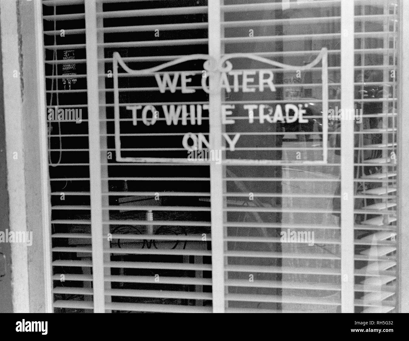 Sign on a restaurant: 'We Cater to White Trade only.', taken in Lancaster, Ohio, August 1938 Stock Photo