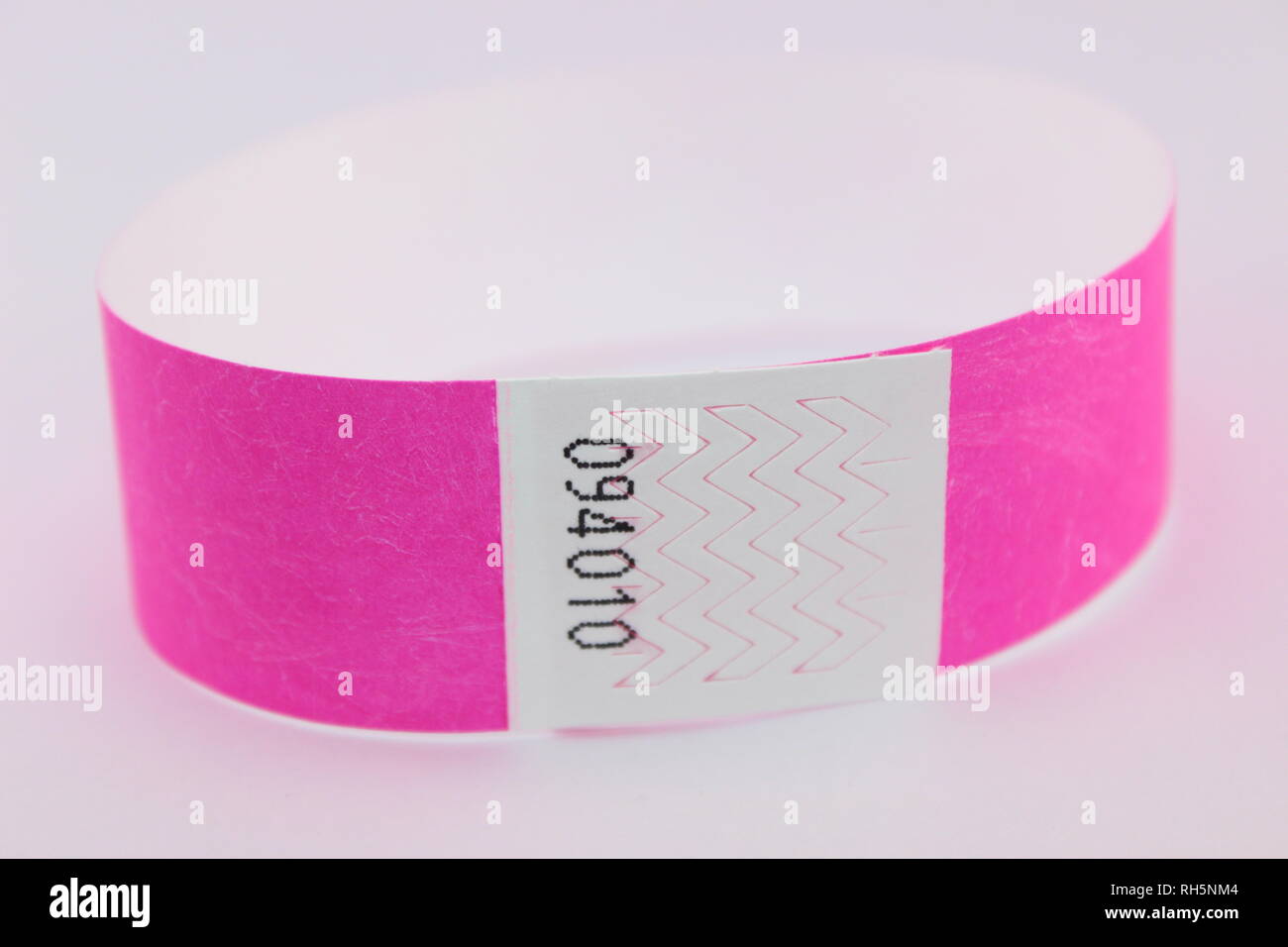 Colorful Pink Tyvek wristbands for concerts, events and music festivals