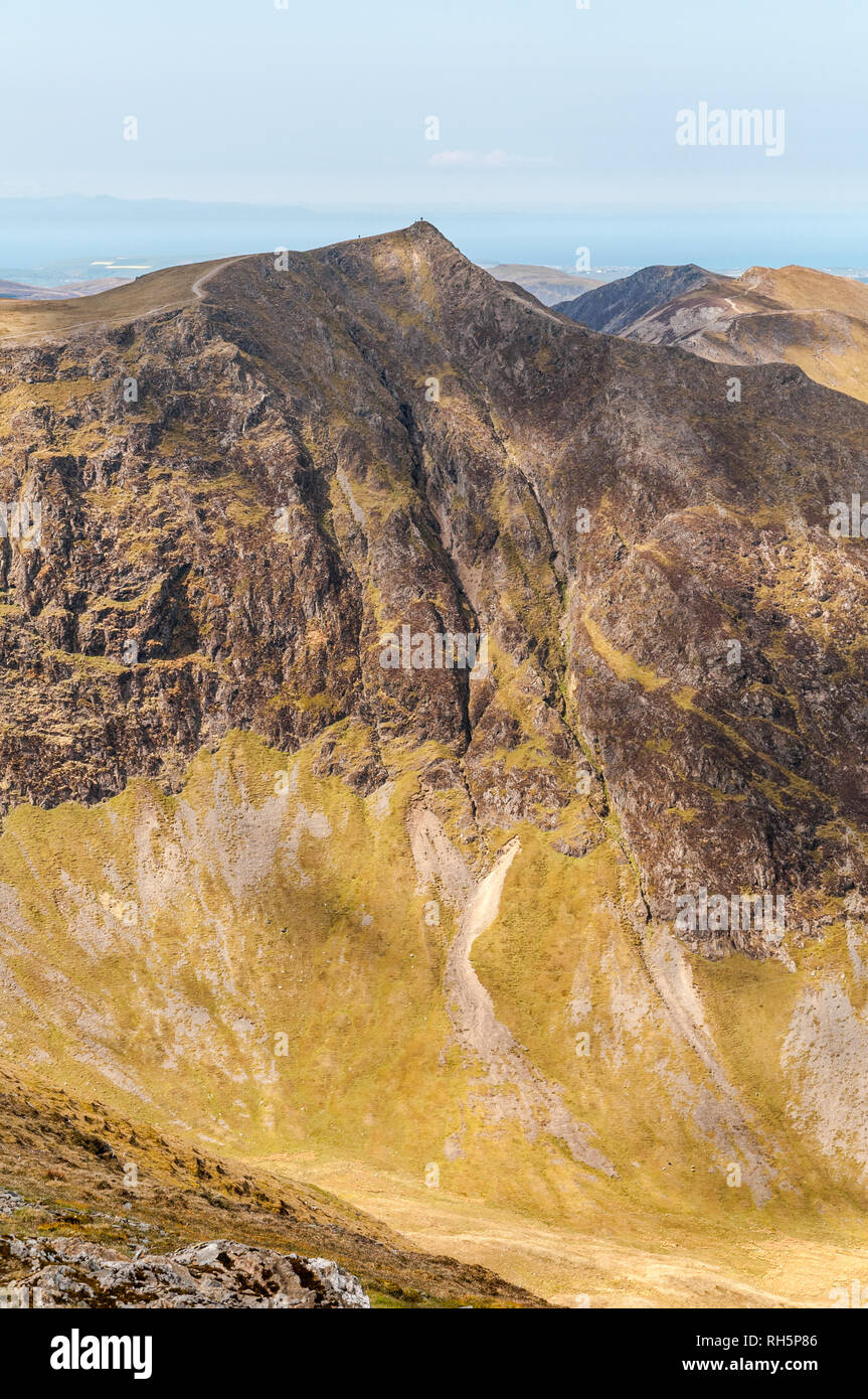 View of Hopgill Head with Hobcarton Crag and the ridge route towards Whiteside in the English Lake District on a clear sunny day in spring. There are  Stock Photo