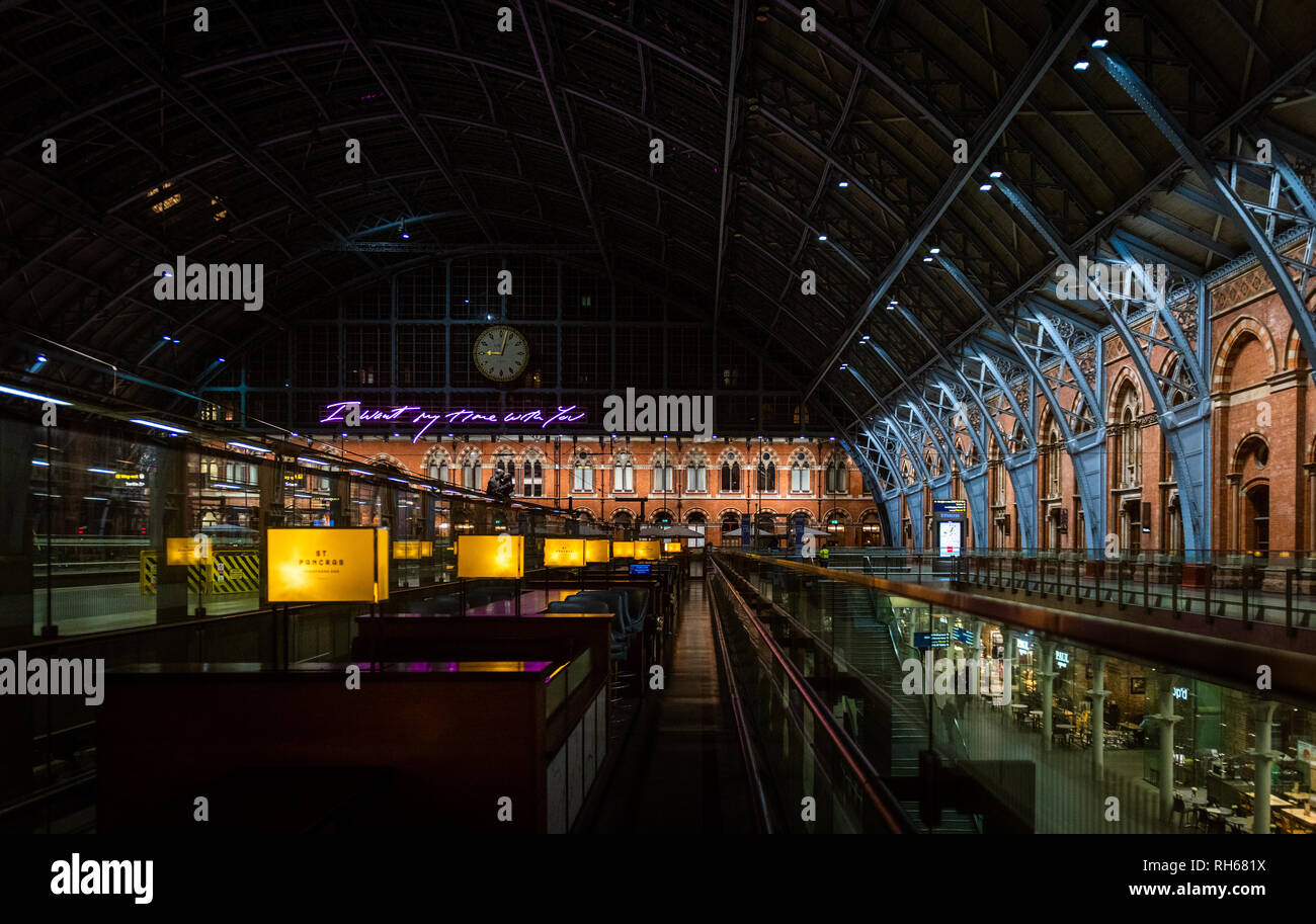 St. Pancreas International train station and the neon sign reading 'I want my time with you' with no people in the image Stock Photo