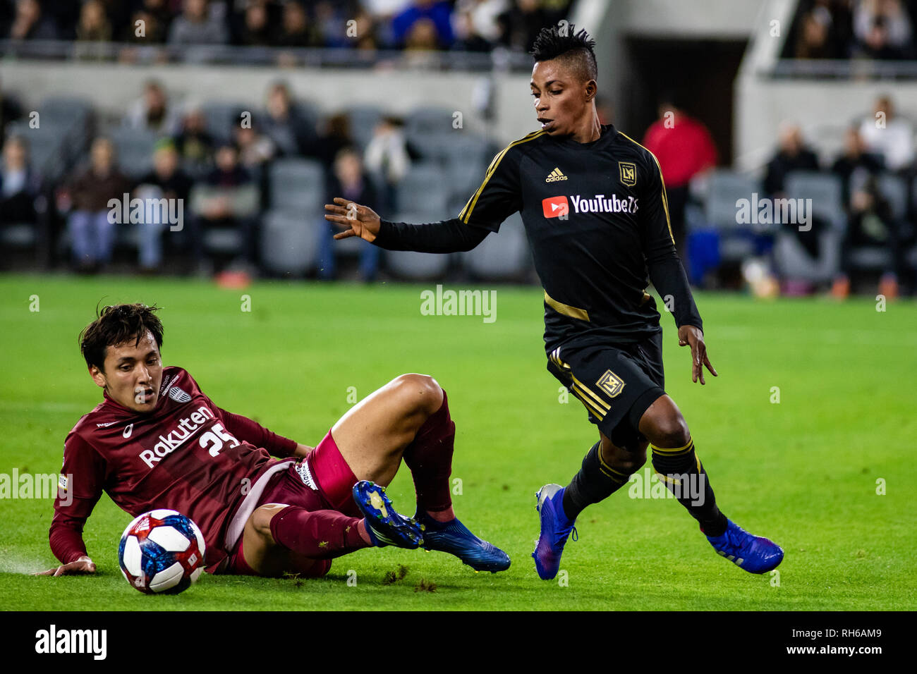 Los Angeles, USA. 31st Jan, 2019. Leo Osaki (25) of Vissel Kobe makes a last ditch tackle to steal the ball from LAFC's Latif Blessing (7). Credit: Ben Nichols/Alamy Live News Stock Photo