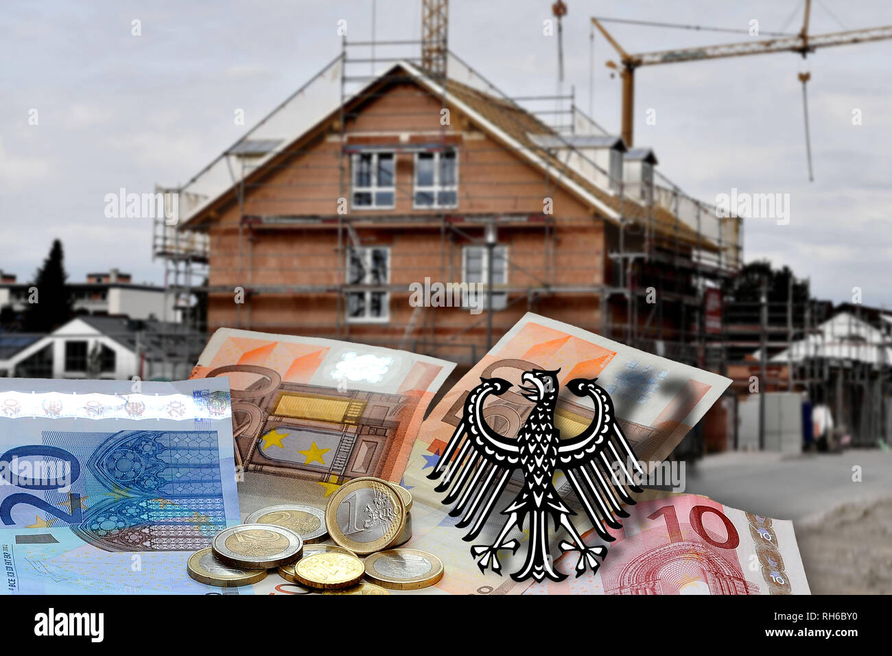 Munich, Deutschland. 01st Feb, 2019. PHOTOMONTAGE: Theme picture property tax. The real estate tax is to be reformed weren.Rohbau, construction site, semi-detached, Zweispaenner, newly built apartments in Ismaning in Speckguertel, surrounding area of Munich, housing construction, building, real estate, freehold.New construction, housing construction, rented apartment, rent, construction boom, tenement building, build, construction, construction, Real Estate, Real Estate, Construction, Metropolitan Area, Surroundings | usage worldwide Credit: dpa/Alamy Live News Stock Photo