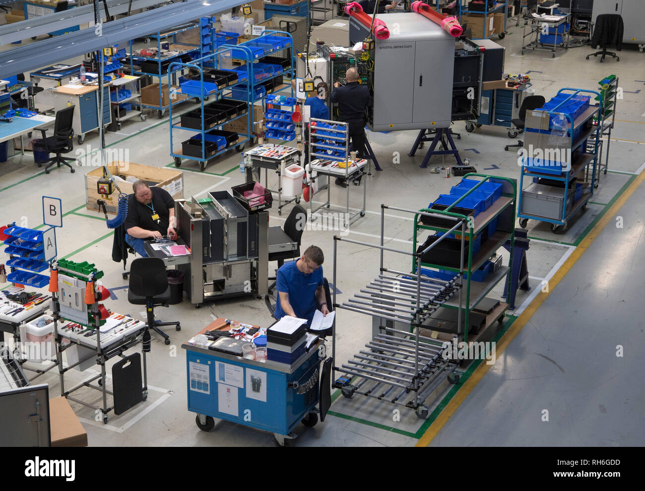 Wiesbaden, Germany. 29th Jan, 2019. Huge baggage scanners are assembled in Smiths  Detection's production hall. Around 600 employees work here on the  development and production of baggage control systems, which will later