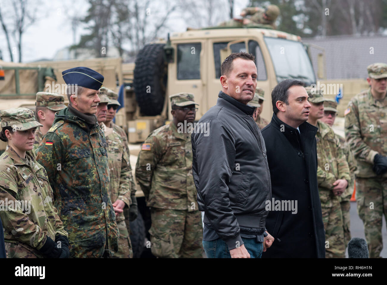 Burg, Germany. 01st Feb, 2019. US Ambassador Richard Grenell (M, r) speaks  to the media representatives in the Clausewitz barracks. Next to him stands  the US General Consul in Leipzig, Timothy Eydelnant.