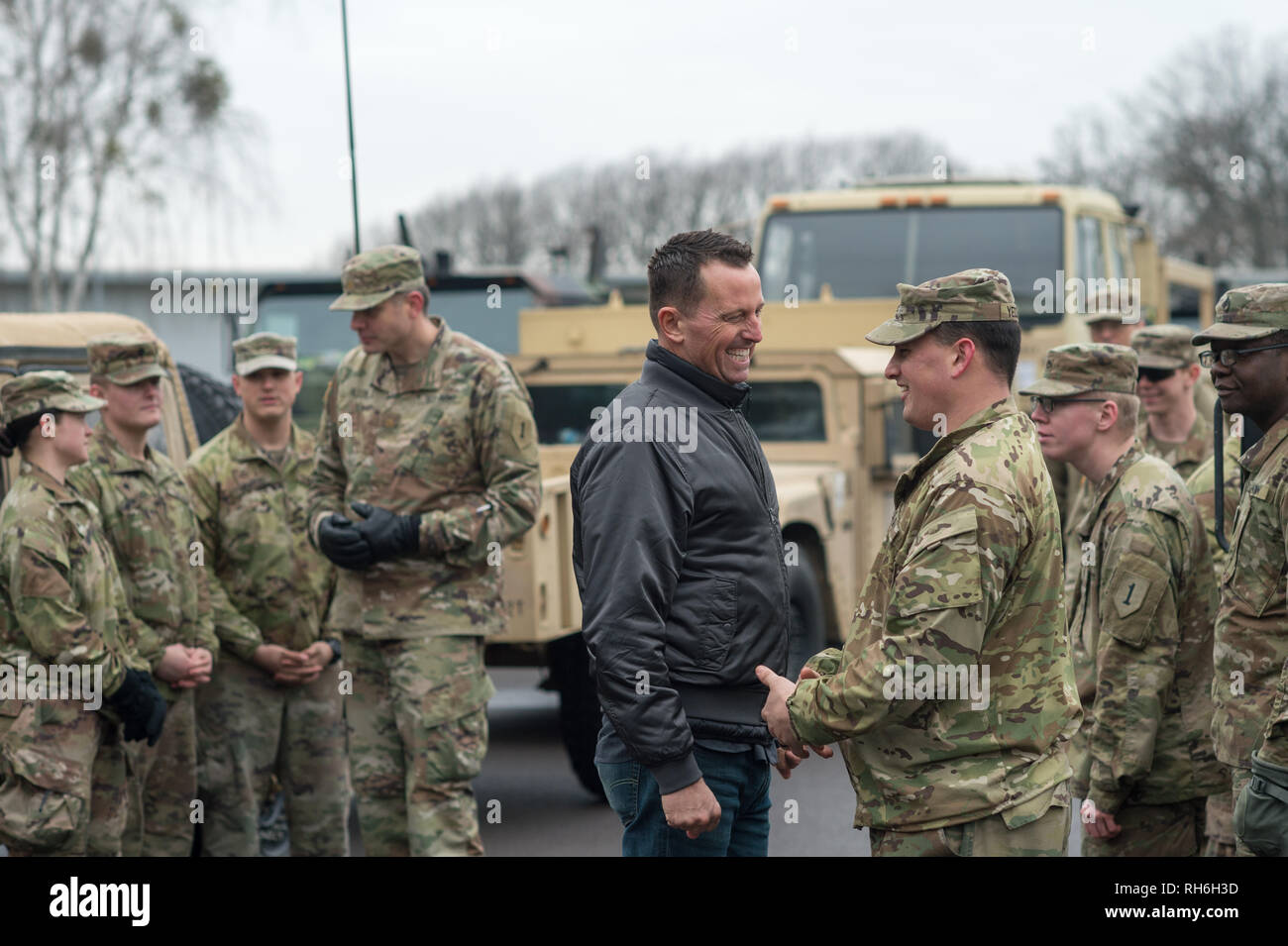Burg, Germany. 01st Feb, 2019. US Ambassador Richard Grenell (M) speaks  with soldiers of the US Army in the Clausewitz barracks. The reason for the  visit is the current US relocation operation 