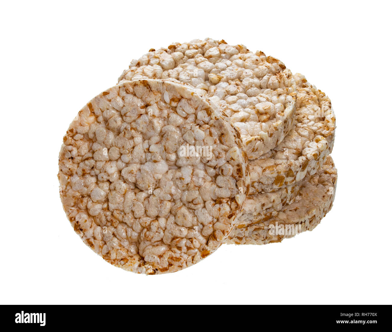 Puffed rice bread isolated on white background, diet crispy round rice waffles Stock Photo