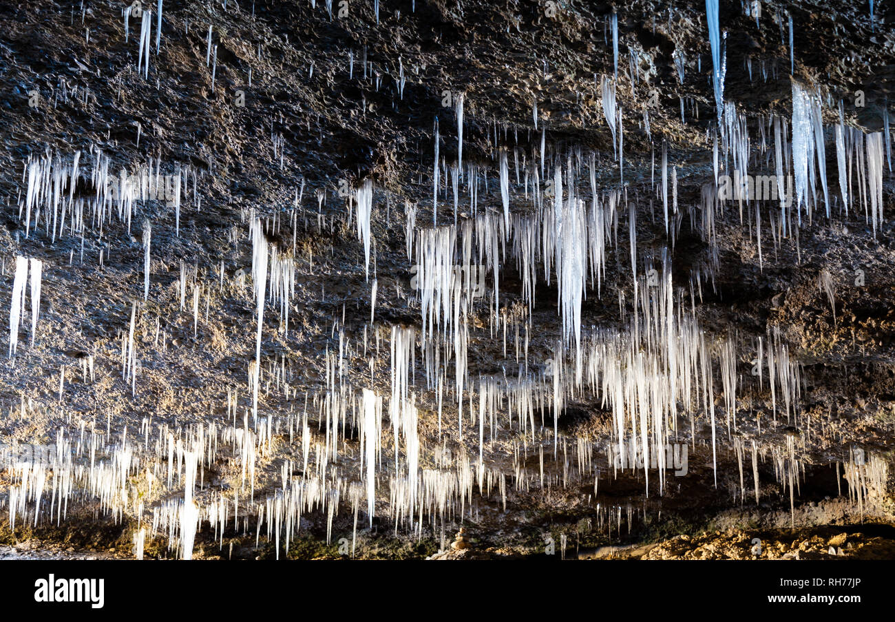 Many icicles hanging from the ceiling of the cave Stock Photo - Alamy