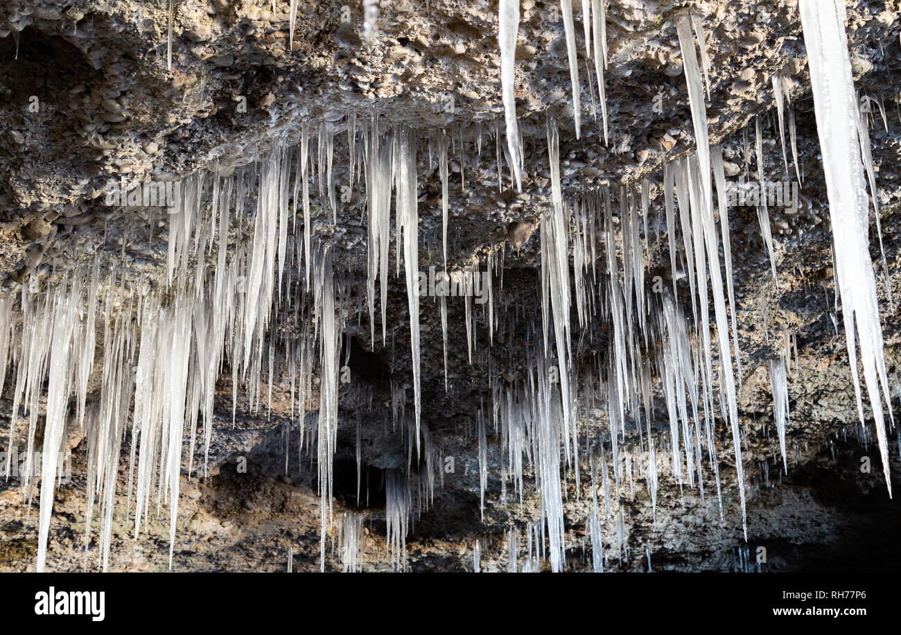 Many icicles hanging from the ceiling of the cave Stock Photo - Alamy
