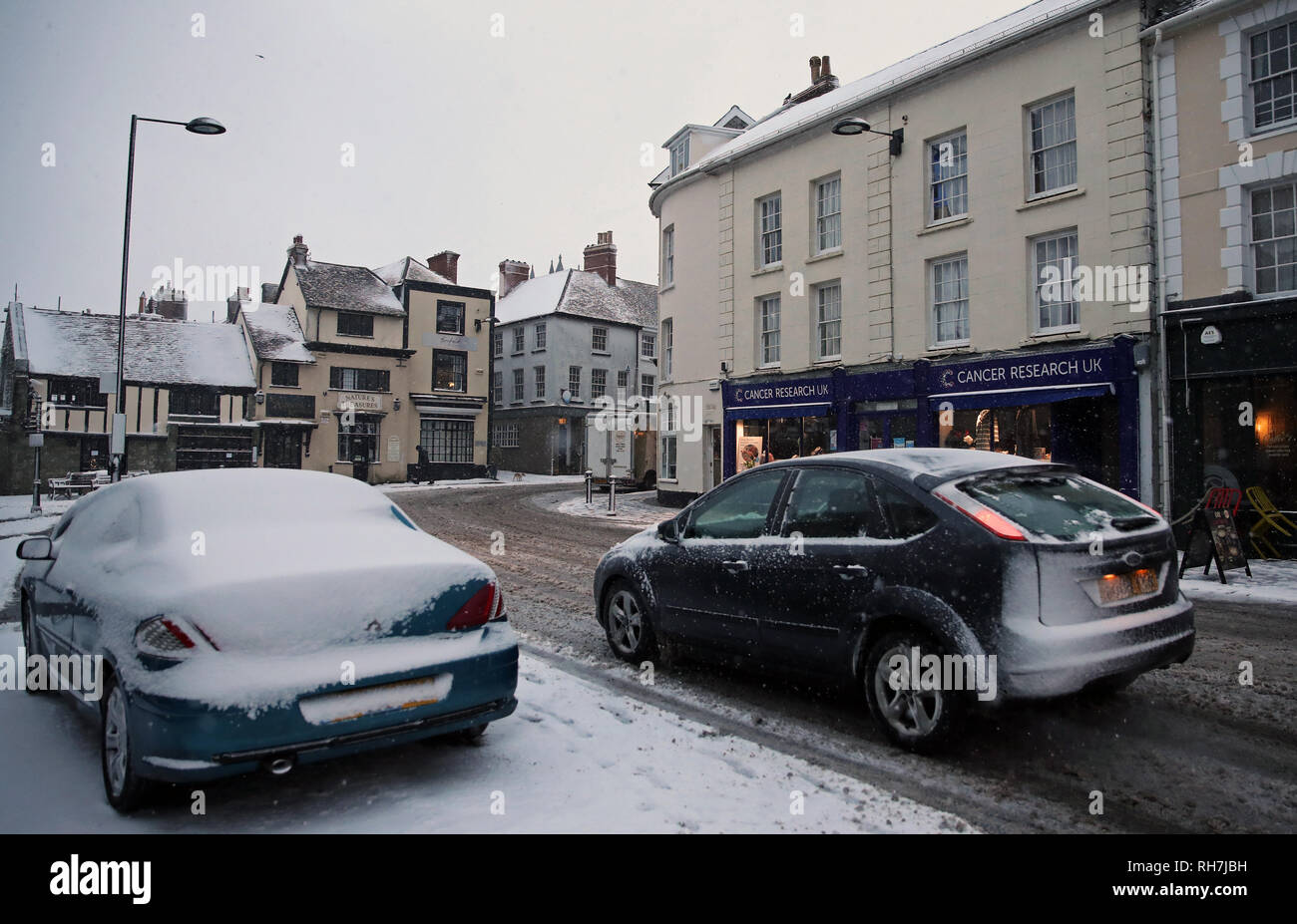 A car makes its way along the High Street in Shaftesbury, Dorset, after