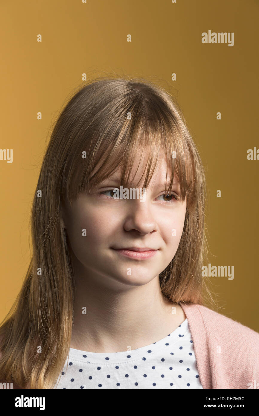 Portrait confident tween girl Stock Photo