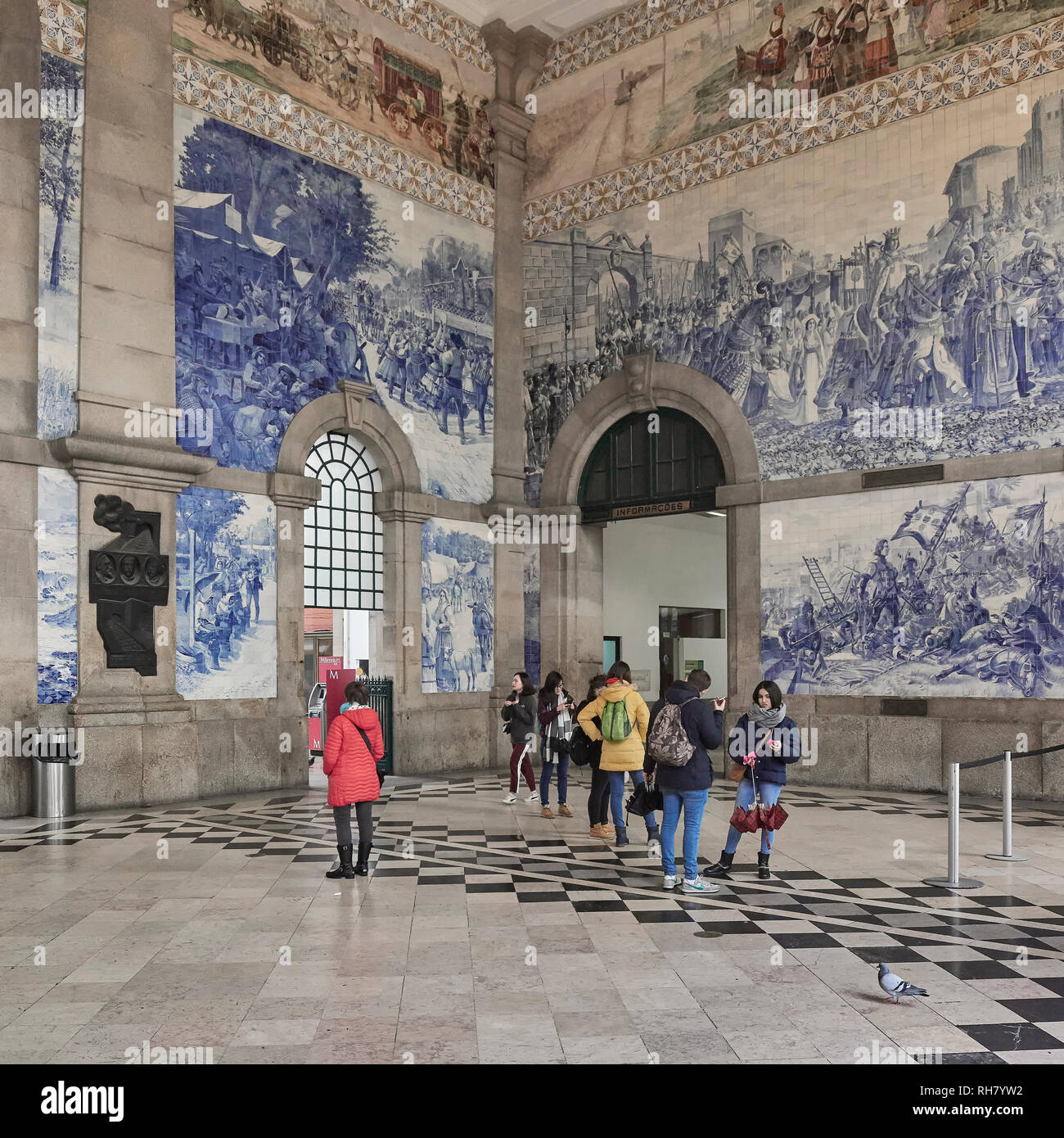 Hall of the San Bento train station decorated with blue tiles, an account of the history of Portugal in the city of Porto Stock Photo