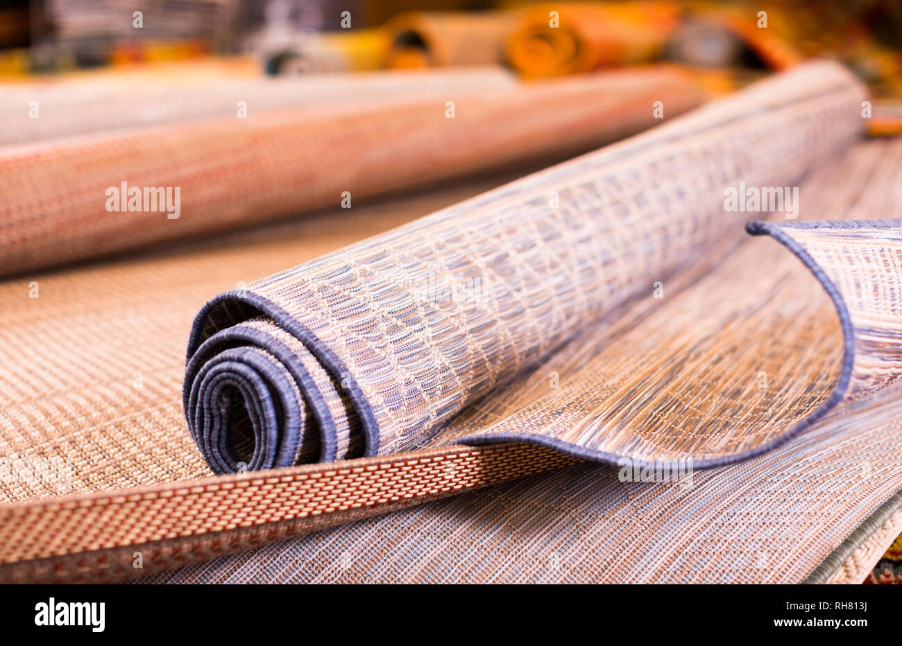 diversity of straw carpets in the store for home decor Stock Photo Alamy