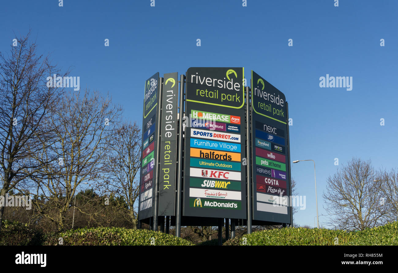 Roadside sign board for Riverside Retail Park, an out of town shopping complex, Northampton, UK Stock Photo