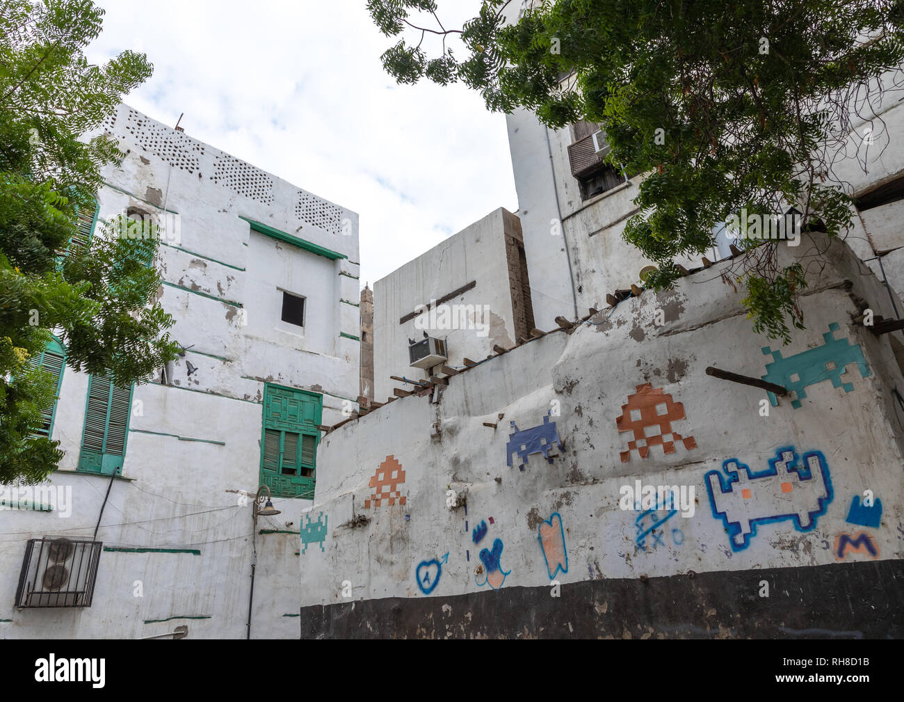 Space invaders art on the wall of a house, Mecca province, Jeddah, Saudi Arabia Stock Photo