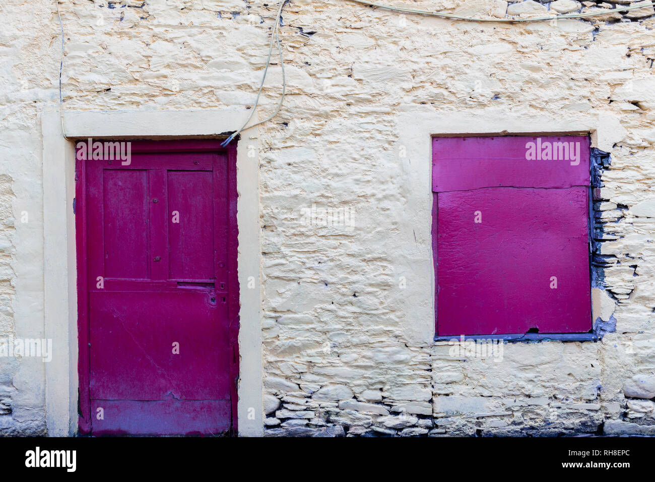 Boarded up window in old cottage, Valentia Island, County Kerry, Ireland Stock Photo