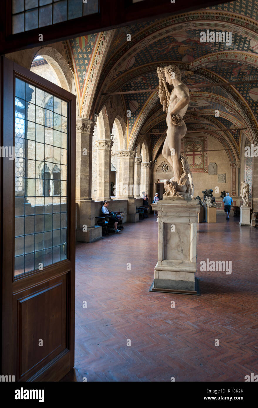 Florence, Italy - 2018, July 1: A view of the Loggia, on the first floor of the Bargello National Museum. In the foreground, the “Giasone” marble stat Stock Photo