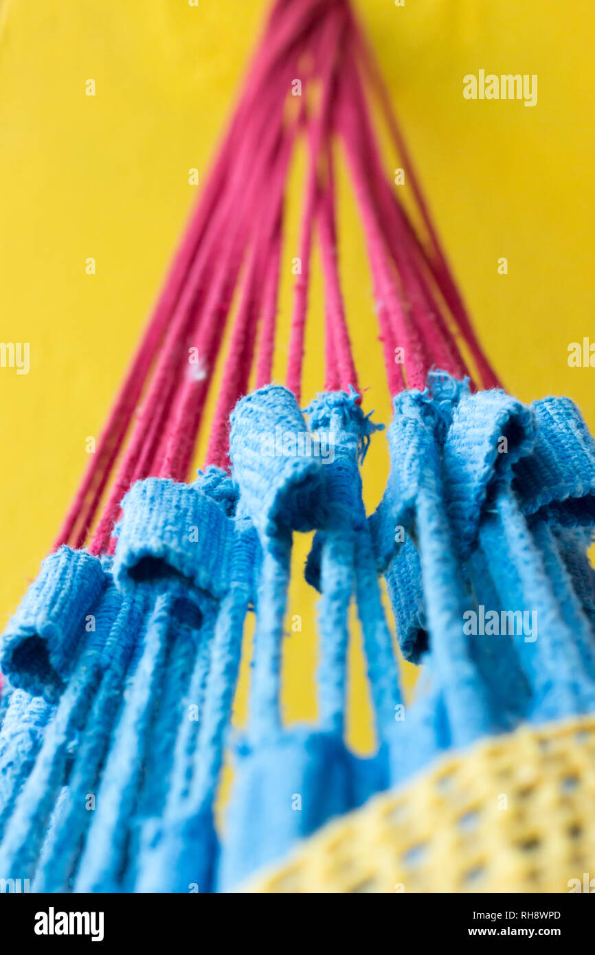 Detail of a Brazilian handicraft hammock with vivid and primary colors taken in Ceara, Brazil. 2017 Stock Photo