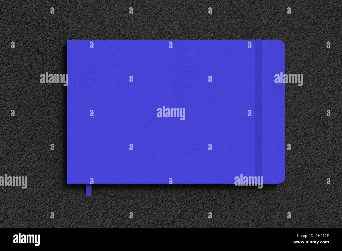 Blue horizontal notebook with elastic band on black background Stock Photo