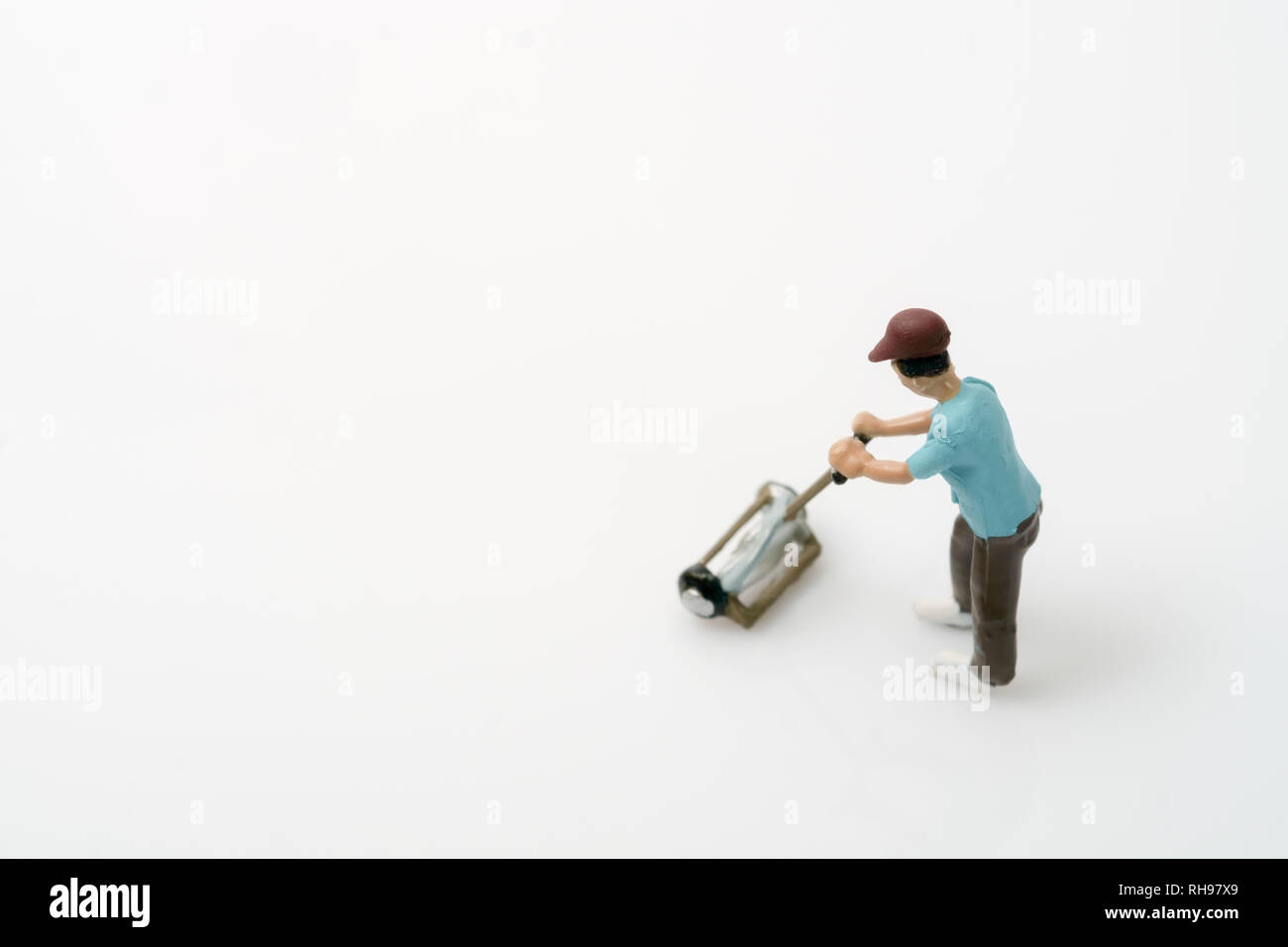 tiny toy lawn mower