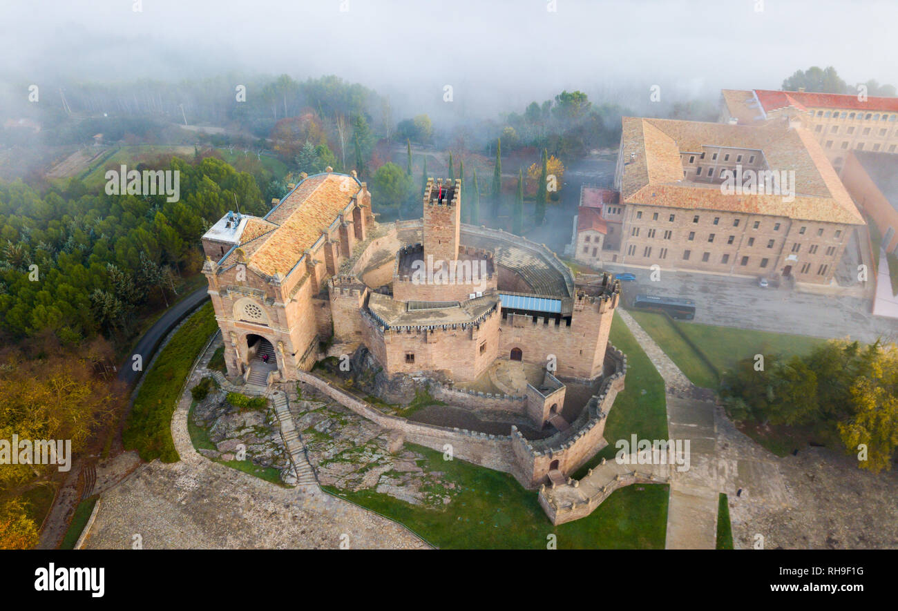 Aerial view of ancient fortified castle Castillo de Javier in foggy autumn morning, Spain Stock Photo