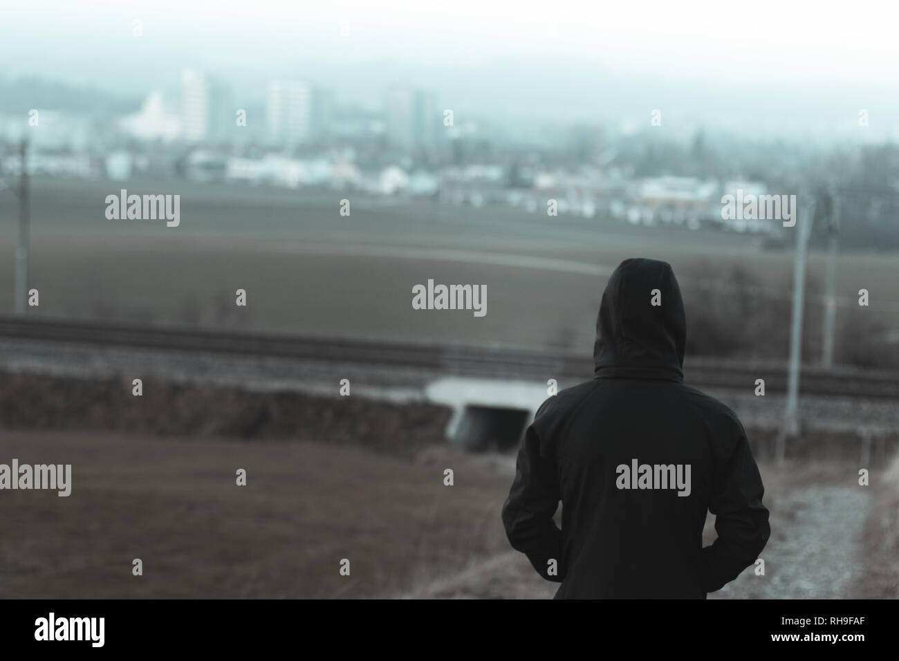 Back view young man silhouette hi-res stock photography and images - Alamy