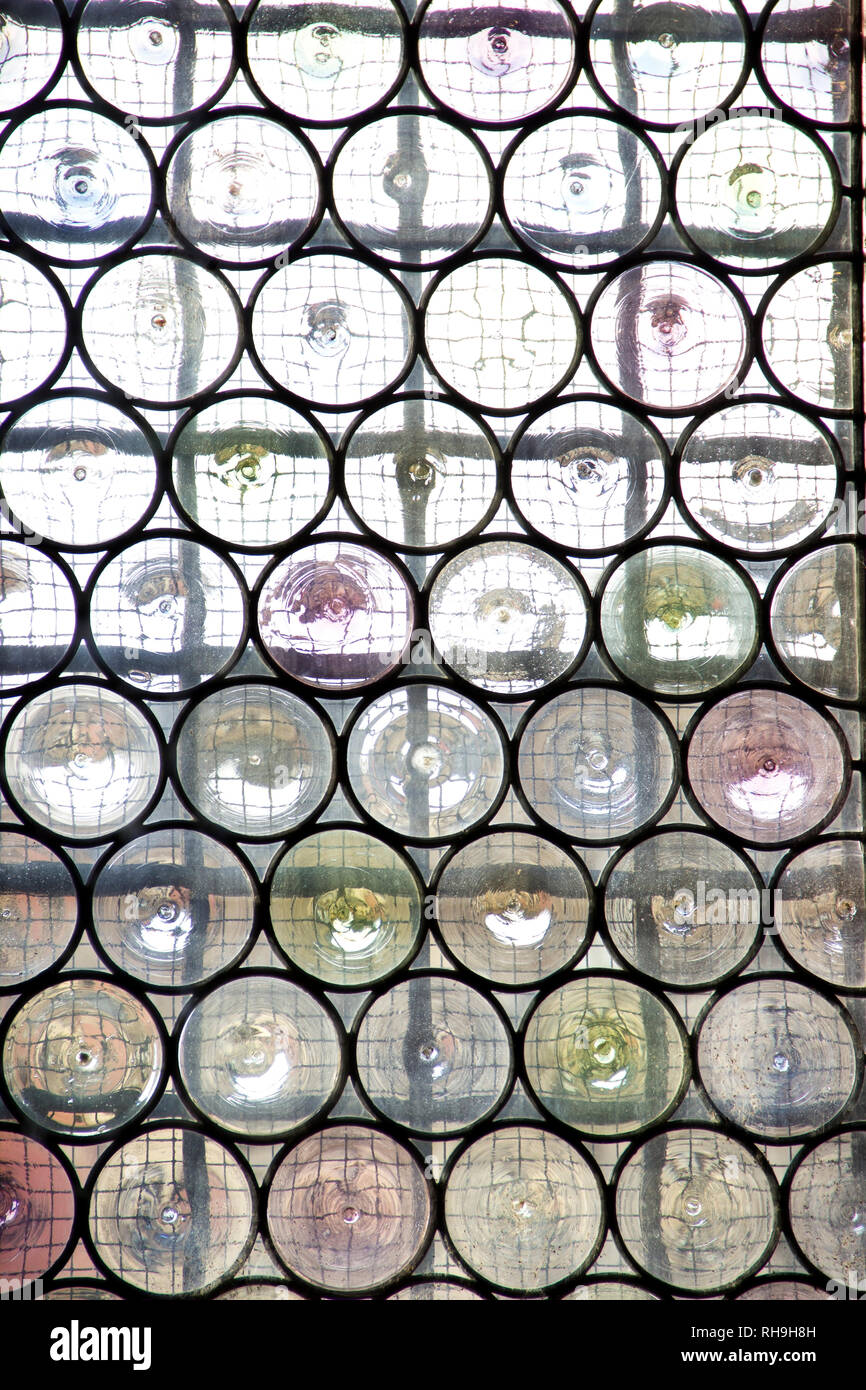 Window with reinforced glass and decorative metal net Stock Photo