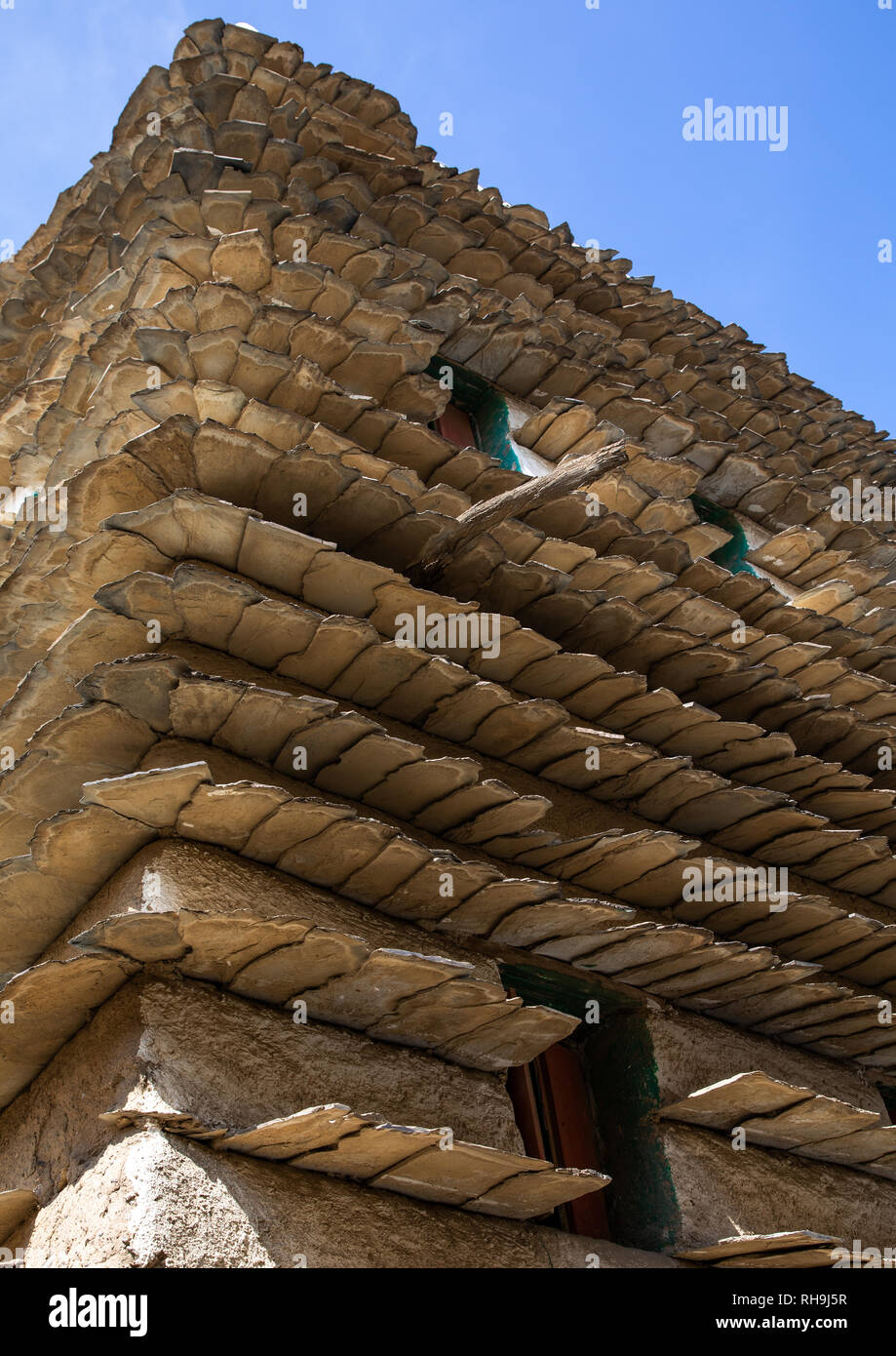 Stone and mud house with slates in al-Basta disctrict, Asir province, Abha, Saudi Arabia Stock Photo