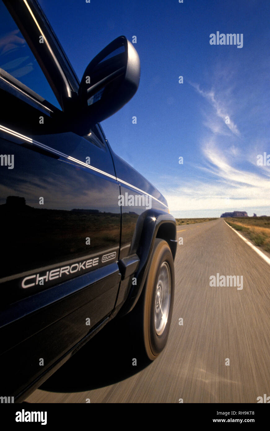 Jeep cherokee driving in the four corners region of Southwest USA Stock