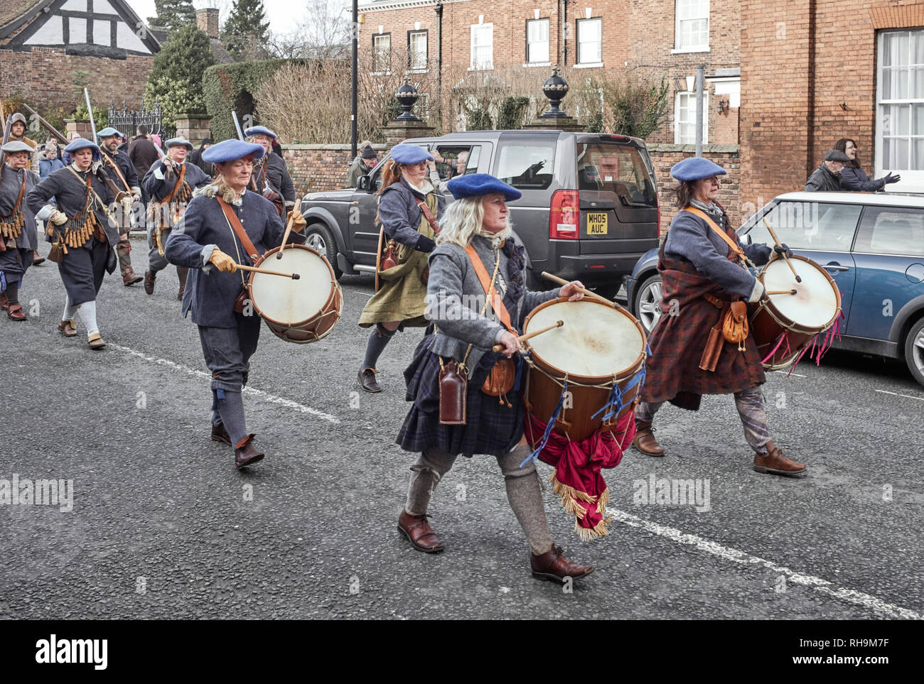 Members of the Sealed Knot society march down Welsh Row at the 2019 battle of Nantwich re-enactment Stock Photo