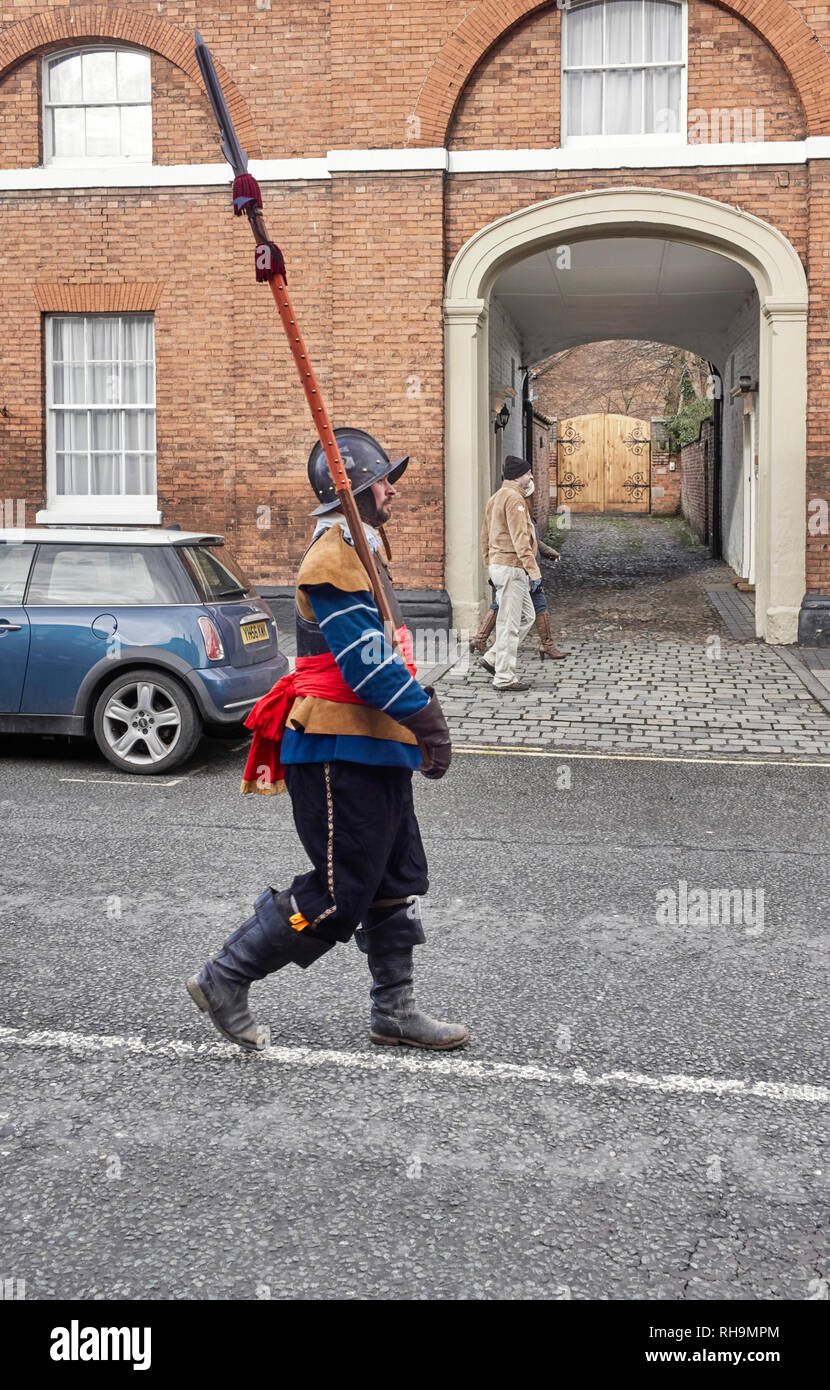 A pikeman member of the Sealed Knot walks down Welsh Row for the 2019 battle of Nantwich re-enactment Stock Photo
