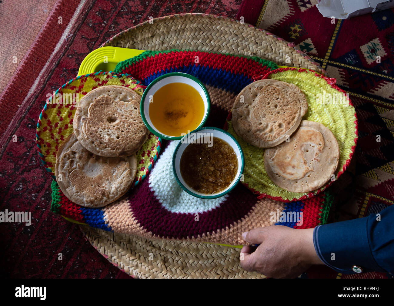 Bread with ghee and honey served to guests in a majlis, Asir province