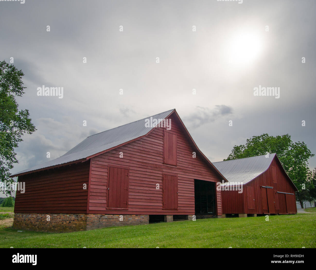A Pair Of Historic Old Red Barns At Windsor Castle Park In