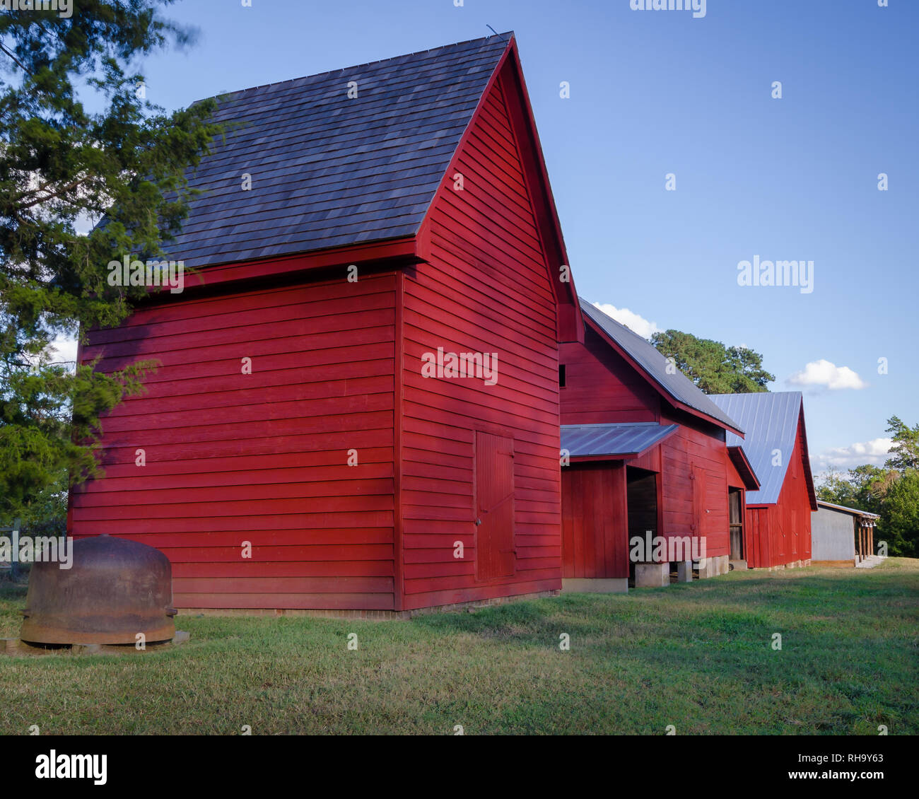 Three red barns at Windsor Castle Park in Smithfield, Virginia Stock