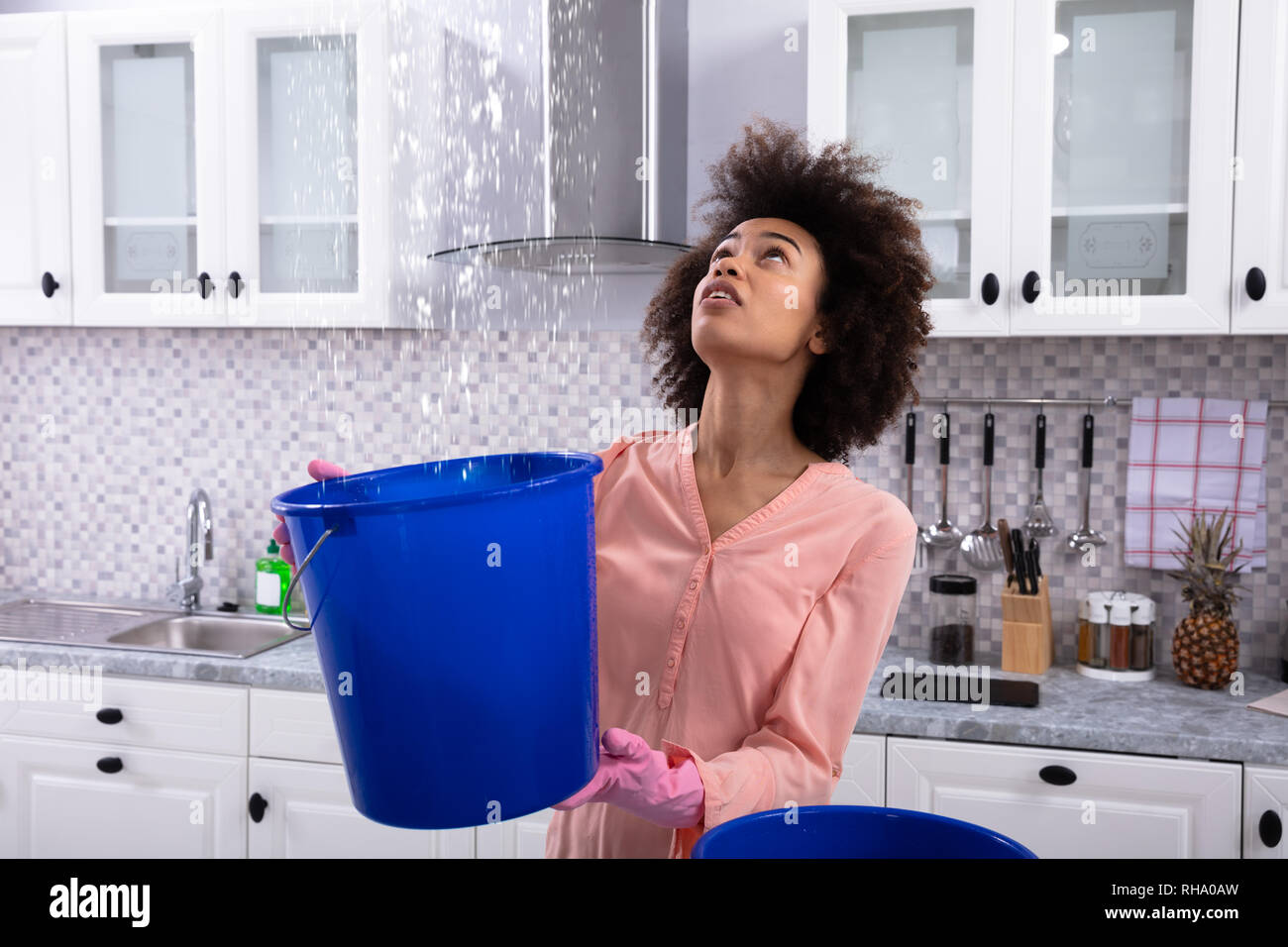 Water dripping into bucket hires stock photography and images Alamy
