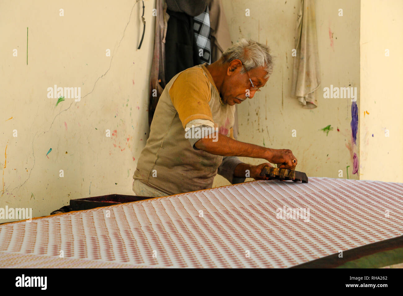 Traditional male Indian carpet weaver in Jaipur,Rajasthan, India, Asia Stock Photo