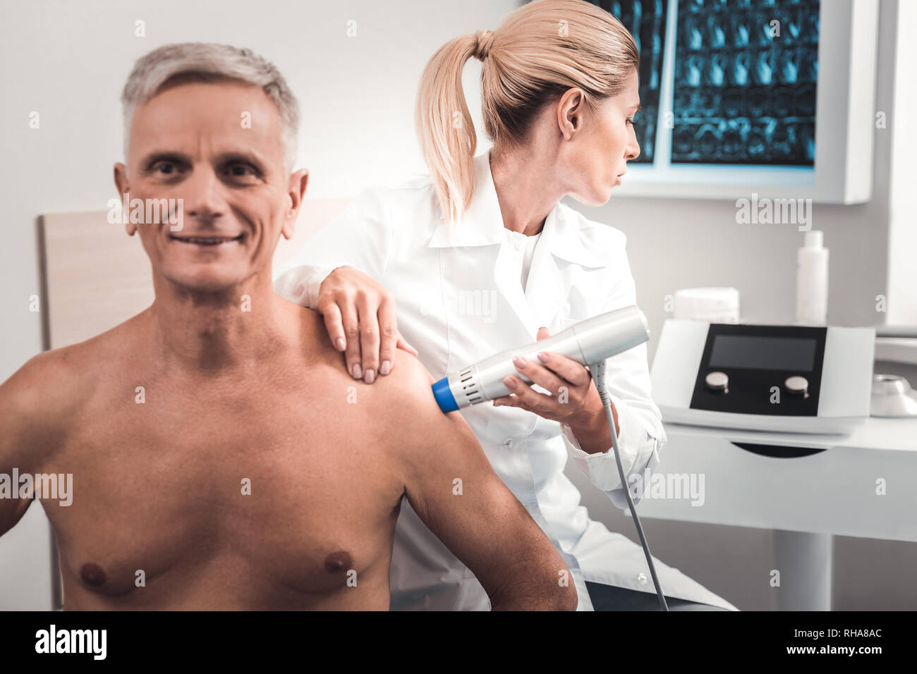 Young doctor using modern medical facilities for examination Stock Photo