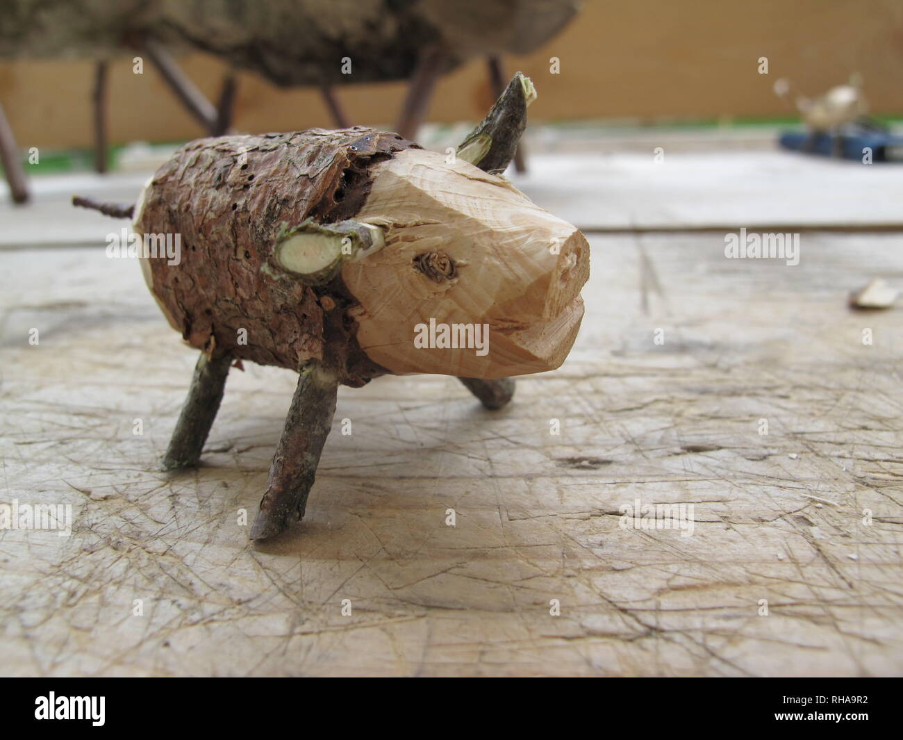 Decorative toy pig. Handcraft project with natural materials without any glue or screws. Stock Photo