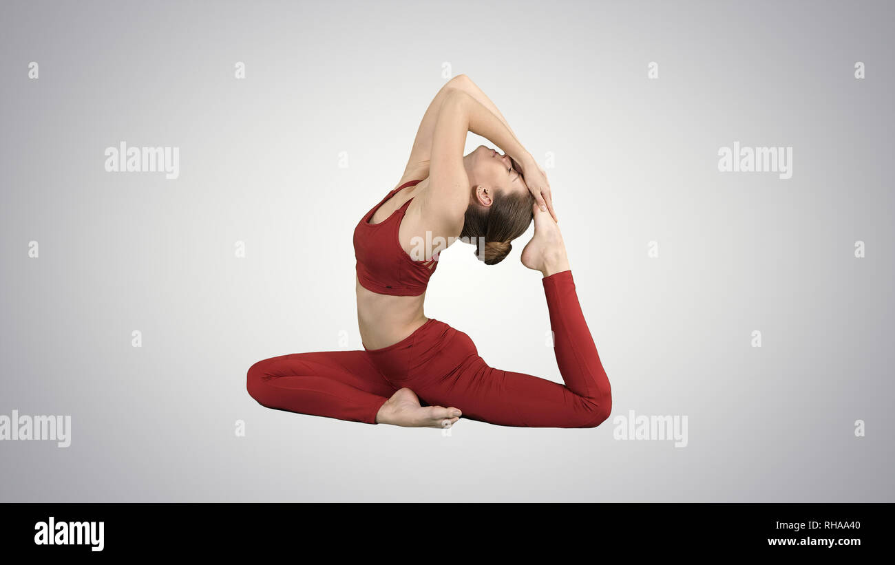 Woman Performing One-Legged King Pigeon Pose on Yoga Mat Stock Photo -  Image of hatha, grace: 154693900