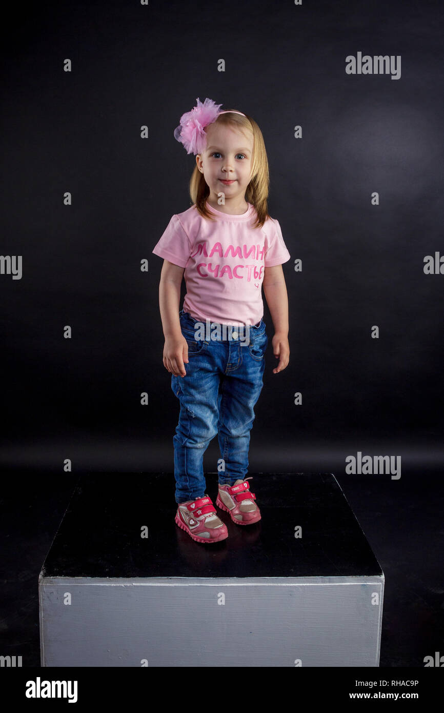 pink t shirt black jeans