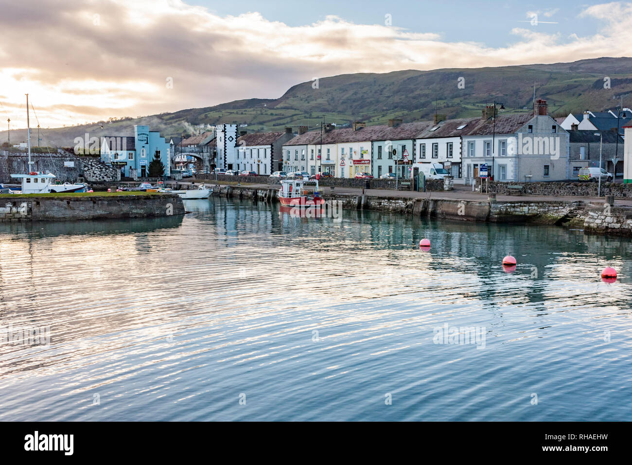 Picturesque port on the shores of Carnlough Bay. Typical village in Northern Ireland. Stock Photo