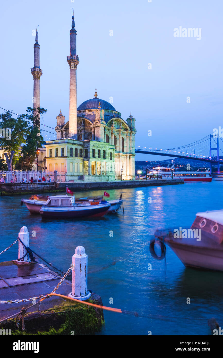Istanbul, Turkey : Ortakoy Mosque illuminated at dusk. It was completed in 1856 by the architect Garabet Balyan in the Besiktas side of the Bosphorus  Stock Photo